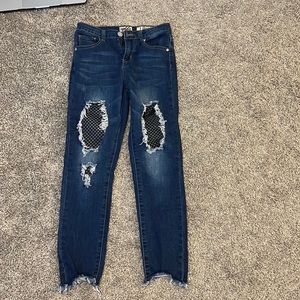 Ripped Jeans with Fishnets